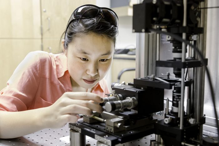 Student working with equipment